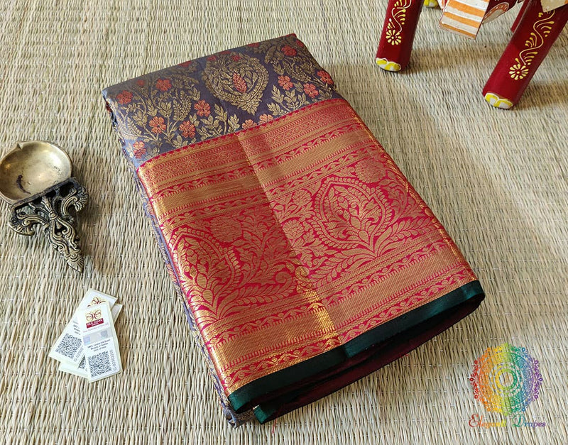 Pure silk Kanjeevaram saree folded neatly to show gold zari work and fabric texture.