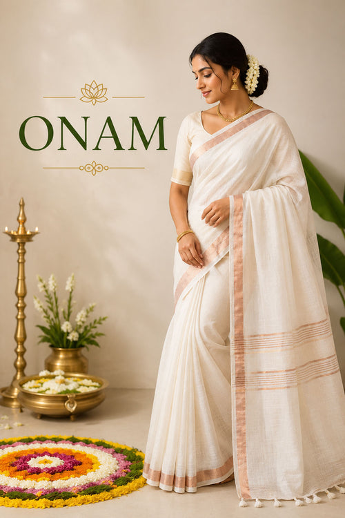 Woman wearing an ivory handloom saree with gold border for the Onam festival.