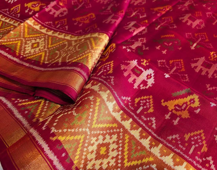 Pure Rajkot Patola Silk Saree in Red with traditional Elephant and Parrot motifs
