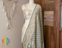 Model wearing Teal Gharchola Dupatta styled with a traditional Indian ethnic outfit