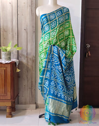 Close up of Bandhani work on Blue Green Gajji silk Gharchola saree