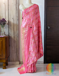 Coral Pink Gharchola Bandhani saree with traditional Gujarati tie dye