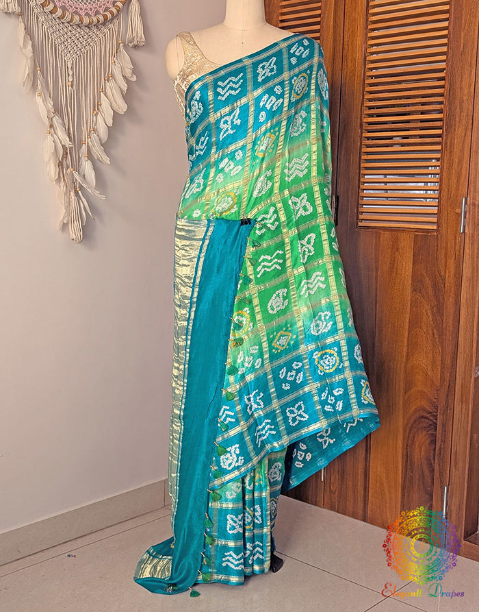 Green Shaded Gharchola Bandhani saree with traditional Gujarati tie dye