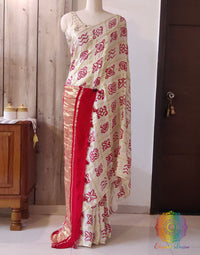 White Gharchola Bandhani saree with traditional Gujarati tie dye