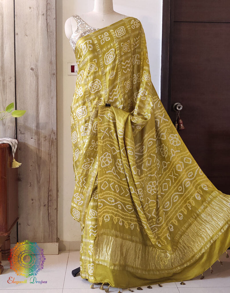 Close up of Bandhani work on Olive Green Gajji silk Gharchola saree