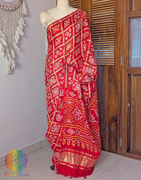 Border detail of Orange Gharchola pure Gajji silk saree