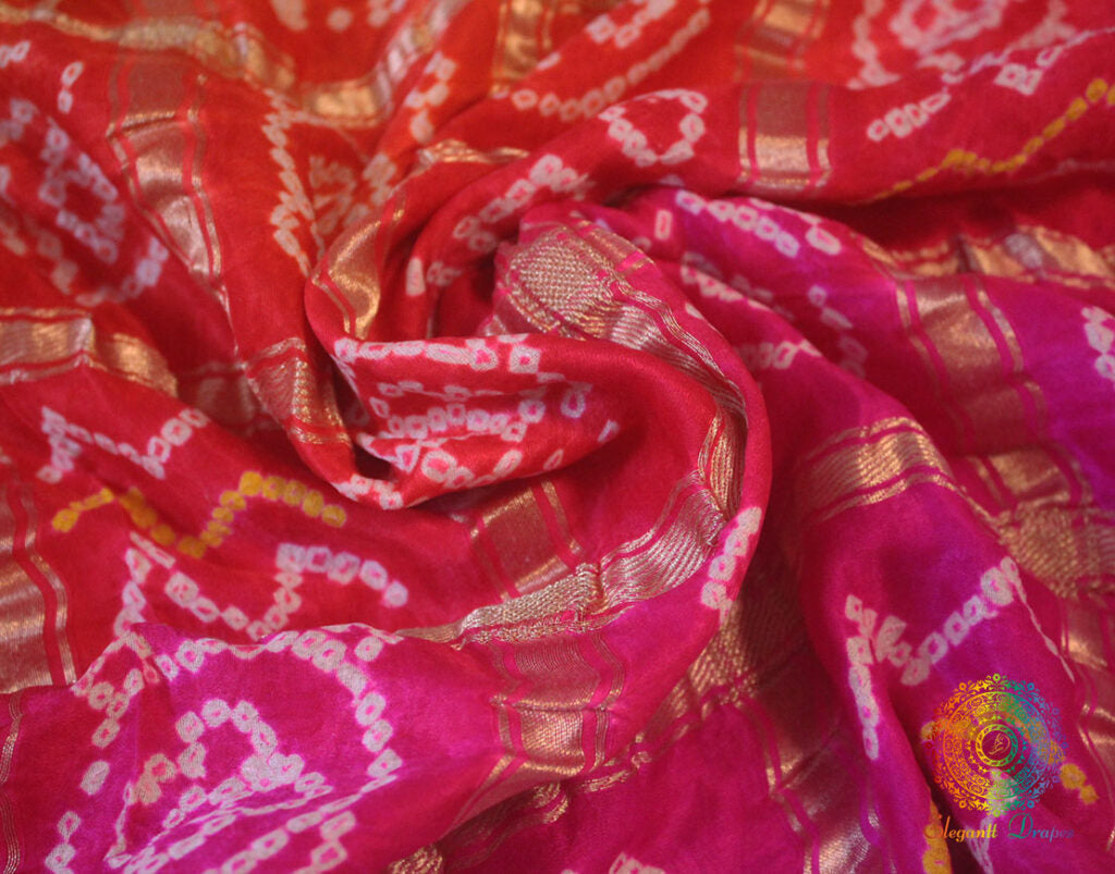 Close up of Bandhani work on Pink Orange Gajji silk Gharchola saree