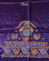 Close-up of Kutch embroidery on sleeve of Purple Mashru Silk Blouse Piece