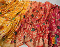 Red yellow Banarasi Bandhani saree with traditional tie and dye patterns