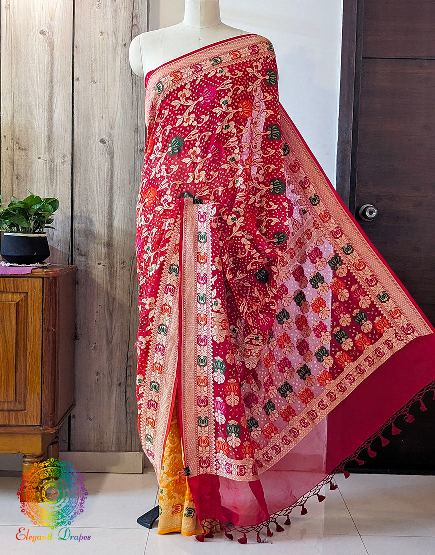 Pallu detail of red yellow Banarasi georgette Bandhani saree