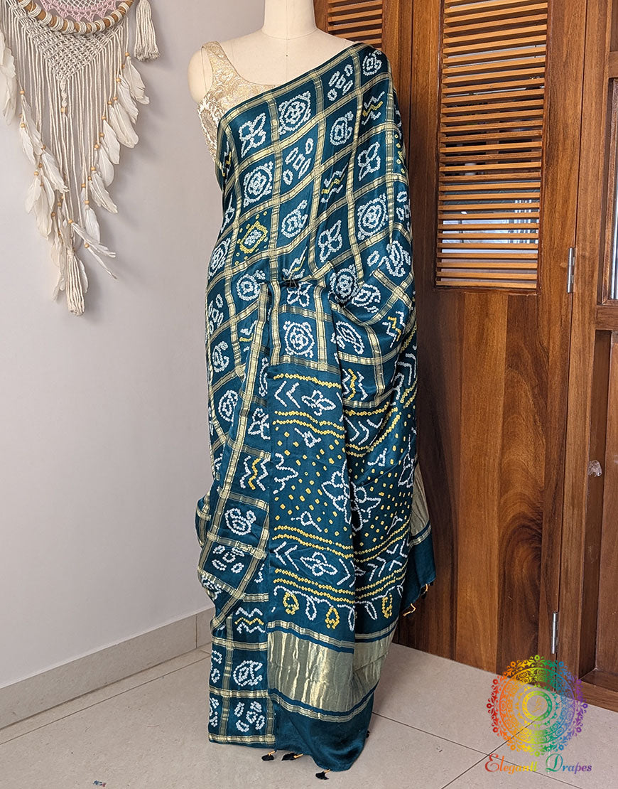 Close up of Bandhani work on Turquoise Gajji silk Gharchola saree