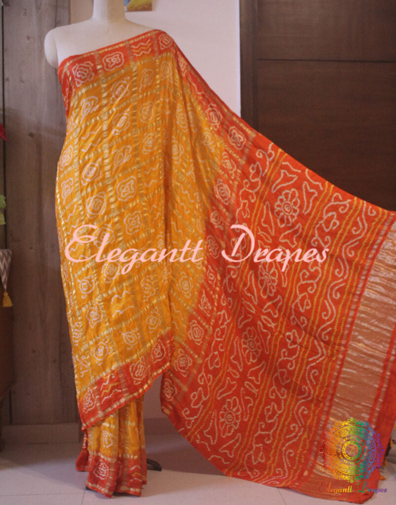 Yellow Orange Gharchola saree pallu with Bandhej detailing