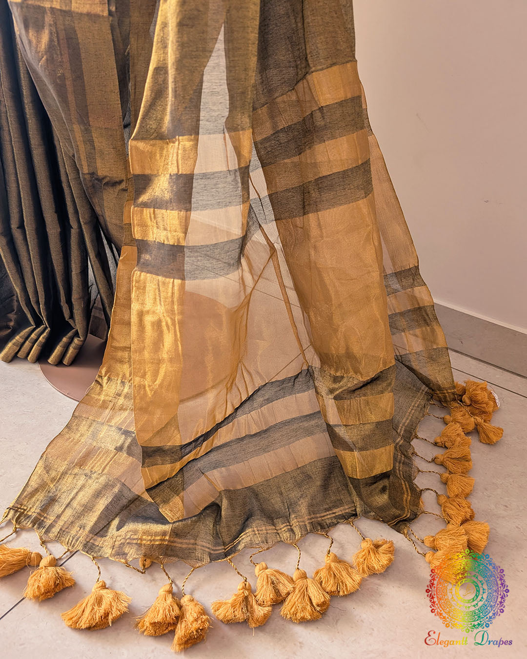 Pom pom detailing on antique gold saree