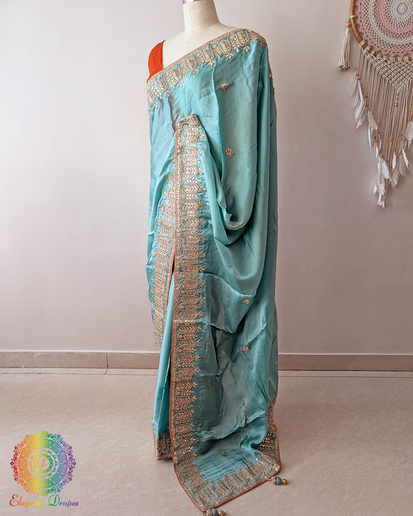 Aqua Blue Satin Crepe Saree side view with Gota Patti Handwork