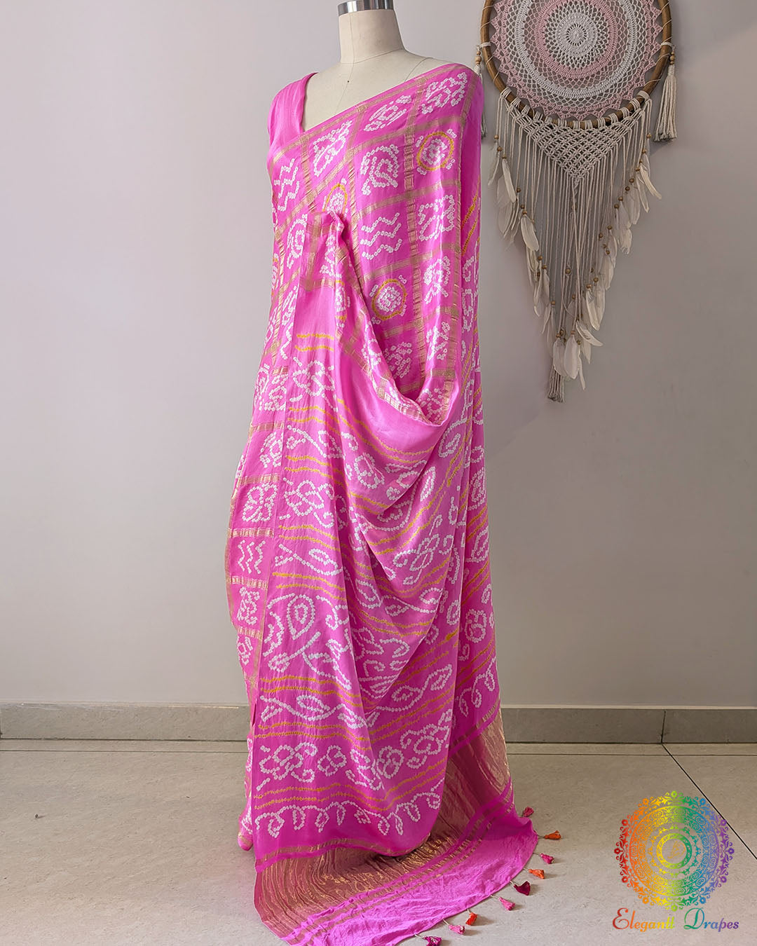 Baby pink palla with zari weaving and traditional Bandhani craftsmanship