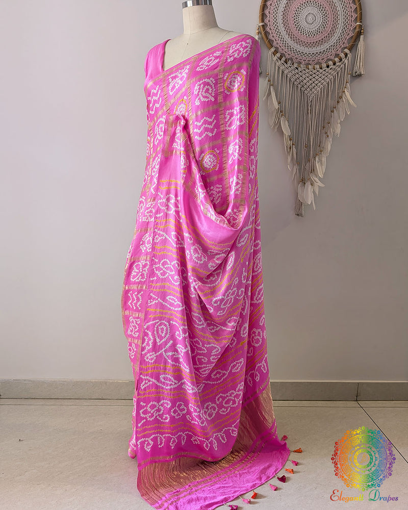 Baby pink palla with zari weaving and traditional Bandhani craftsmanship