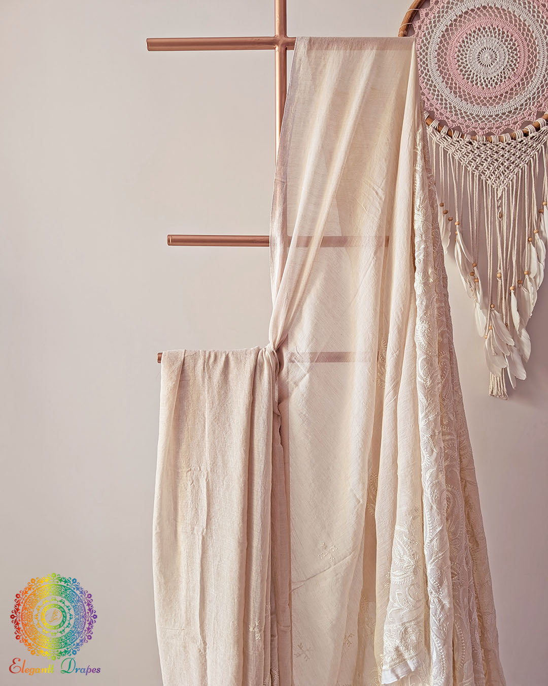Beige cotton saree showcasing intricate all-over Chikankari-inspired threadwork