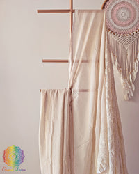 Beige cotton saree showcasing intricate all-over Chikankari-inspired threadwork