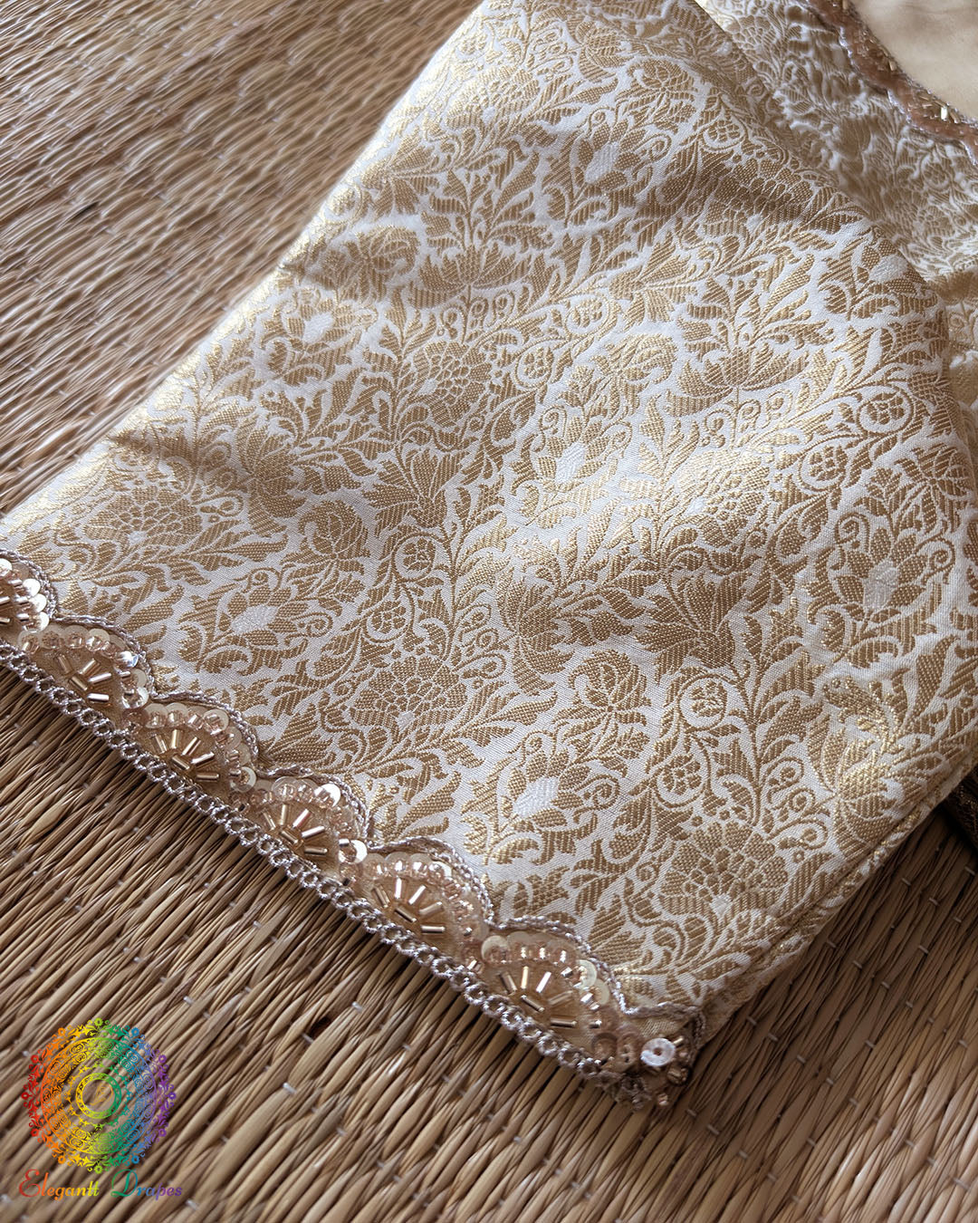 Close-up of the woven Banarasi brocade floral pattern on the Champagne Beige Designer Blouse