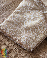 Close-up of the woven Banarasi brocade floral pattern on the Champagne Beige Designer Blouse