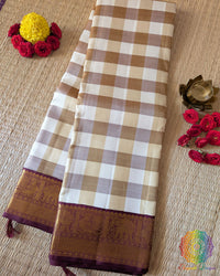 Off White Beige Checkered Pure Kanjivaram Handloom Silk Saree – Folded View showcasing the elegant combination of off white and beige checks, lustrous pure silk fabric and traditional 1gm gold zari detailing.