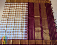 Off White Beige Pure Kanjivaram Handloom Silk Saree – Full Length View highlighting the small checkered design woven across the saree body, with off white and beige tones creating a refined traditional look.