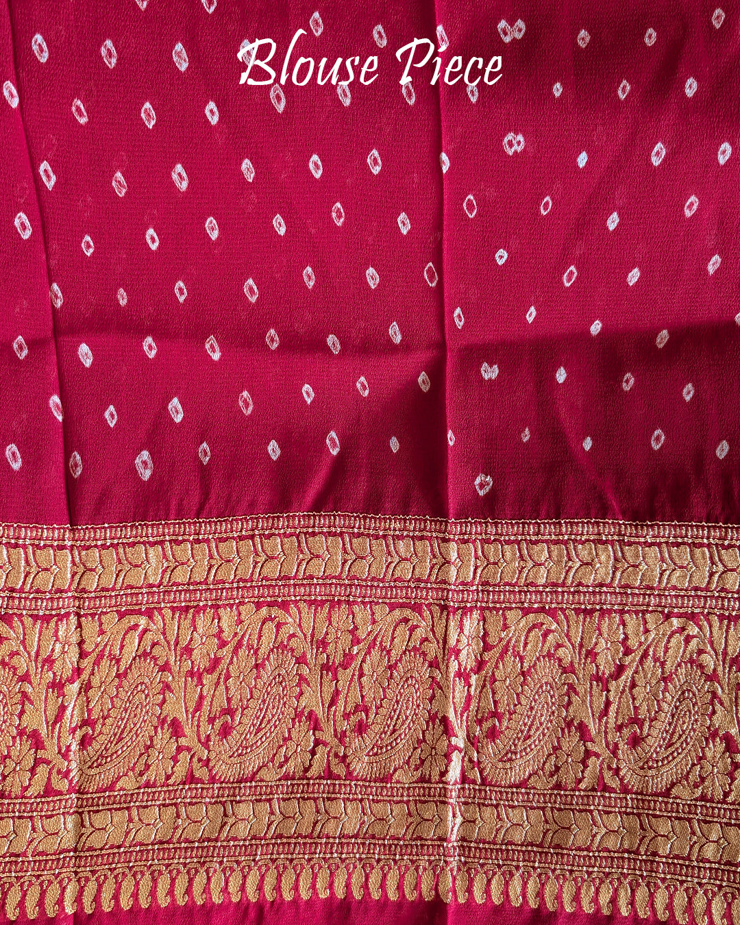 Matching blouse piece in beige red Banarasi khaddi georgette fabric showing weave detail