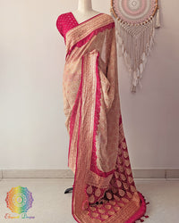 Beige red Banarasi khaddi georgette bandhani saree on mannequin showing full drape