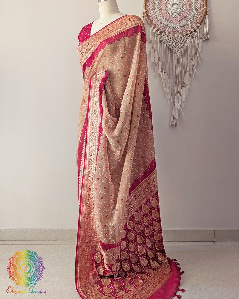 Side angle view of beige saree with red palla highlighting graceful fall