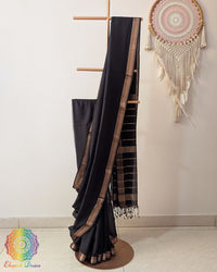 Black Bengal cotton saree with zari border on mannequin showing full drape
