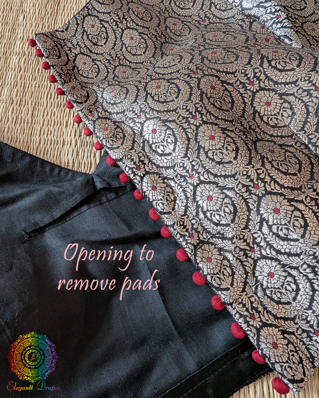 Back opening of the Black Banarasi Brocade Designer Blouse showing removable pad access