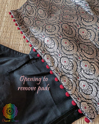 Back opening of the Black Banarasi Brocade Designer Blouse showing removable pad access
