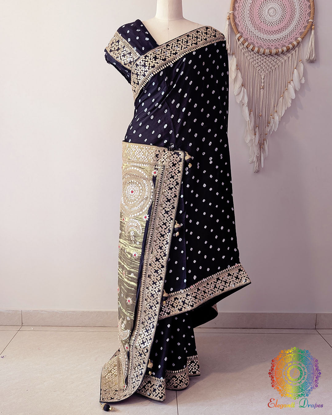 Black bandhani gaji silk saree open view displaying overall pattern and design
