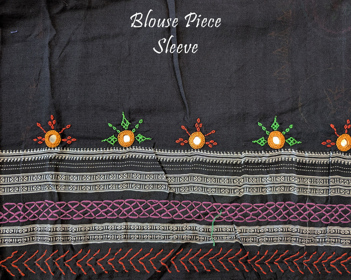 Matching blouse sleeve with handcrafted Lambani embroidery showcasing traditional artisan detailing