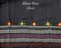 Matching blouse sleeve with handcrafted Lambani embroidery showcasing traditional artisan detailing