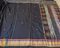 Full black Ilkal cotton saree showcasing traditional Lambani hand embroidery