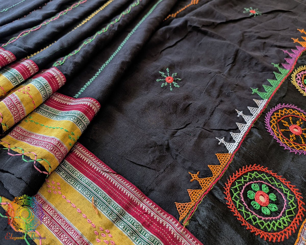 Side view of black Ilkal cotton saree featuring handcrafted Lambani embroidery