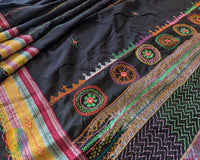 Black Ilkal cotton saree showcasing approximately half-meter heavy Lambani hand embroidered palla
