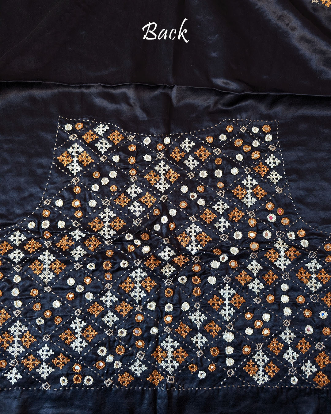 Close-up of heavy Kutch hand embroidery on Black Mashru Silk Blouse Piece back