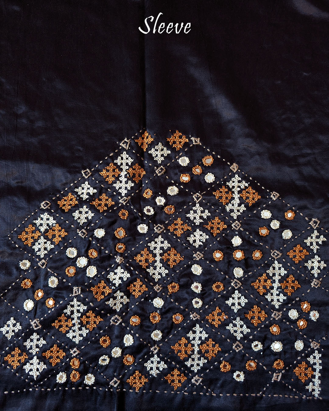 Close-up of extensive Kutch handwork on sleeve of Black Mashru Silk Blouse Piece