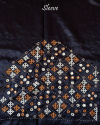 Close-up of extensive Kutch handwork on sleeve of Black Mashru Silk Blouse Piece
