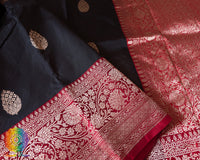 Traditional woven border detail on black Banarasi Katan silk saree