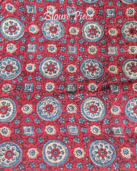 Matching blouse piece in royal blue bandhani gaji silk fabric with Ajrakh detailing