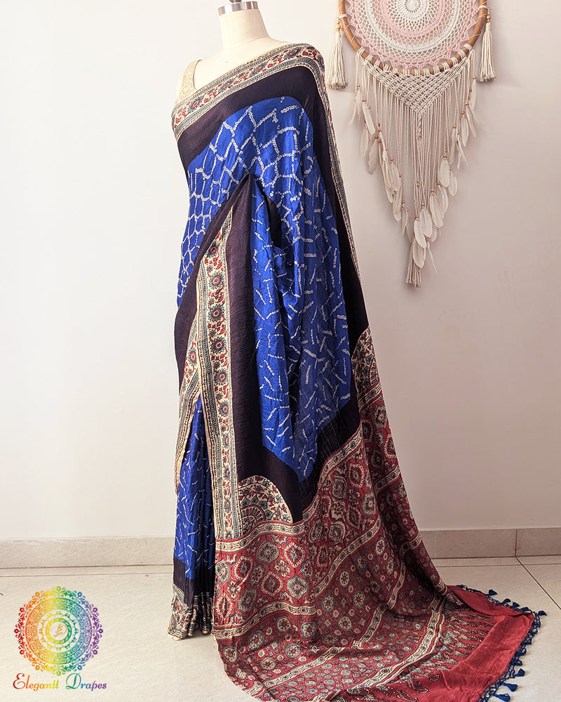 Side angle view of royal blue Ajrakh palla saree on mannequin highlighting drape