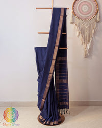 Navy blue Bengal cotton saree with zari border on mannequin showing full drape