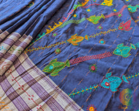 Close-up of intricate multicolored Lambani hand embroidery on the richly embellished palla