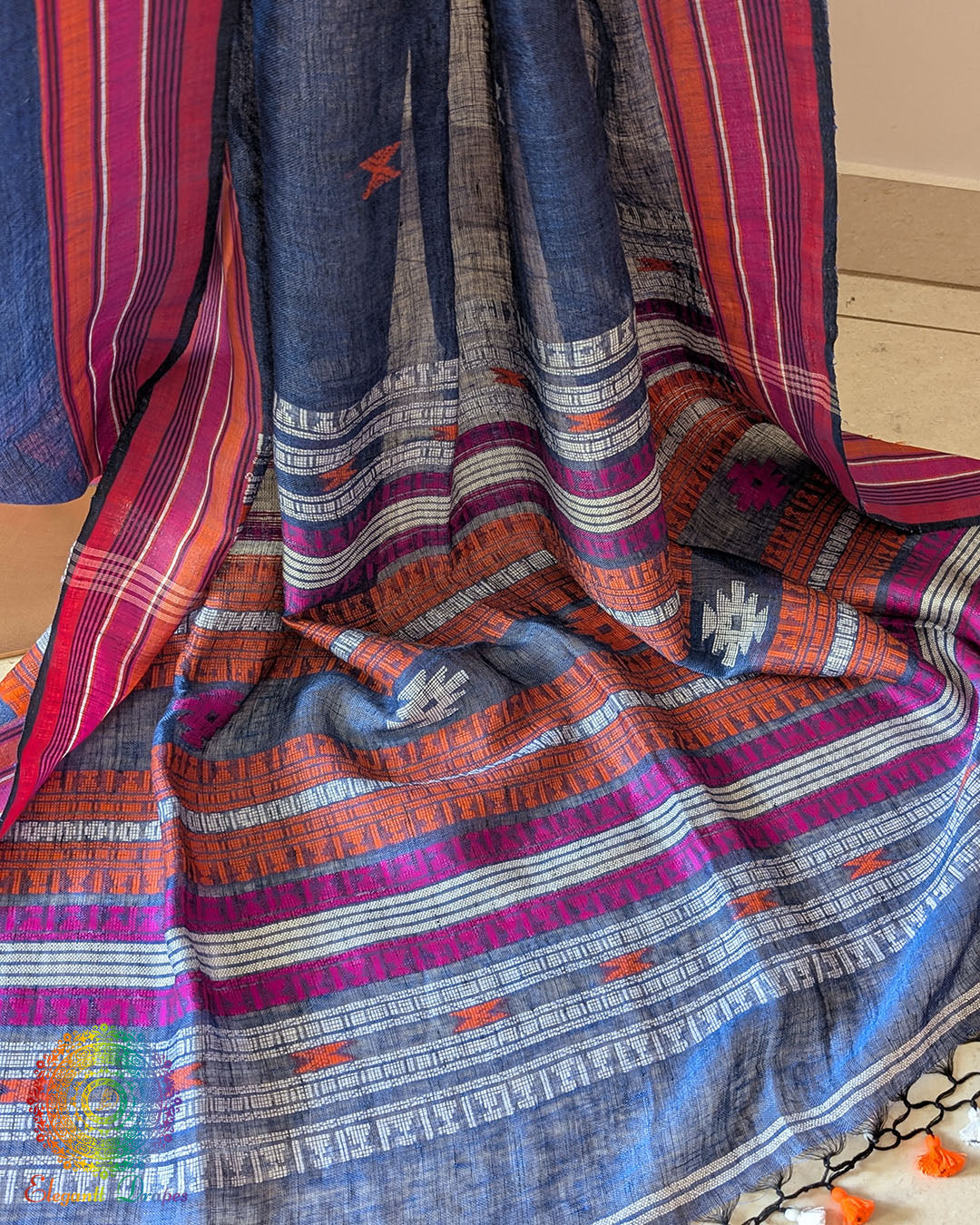 Palla close up on blue linen saree highlighting Bhujodi weave detail