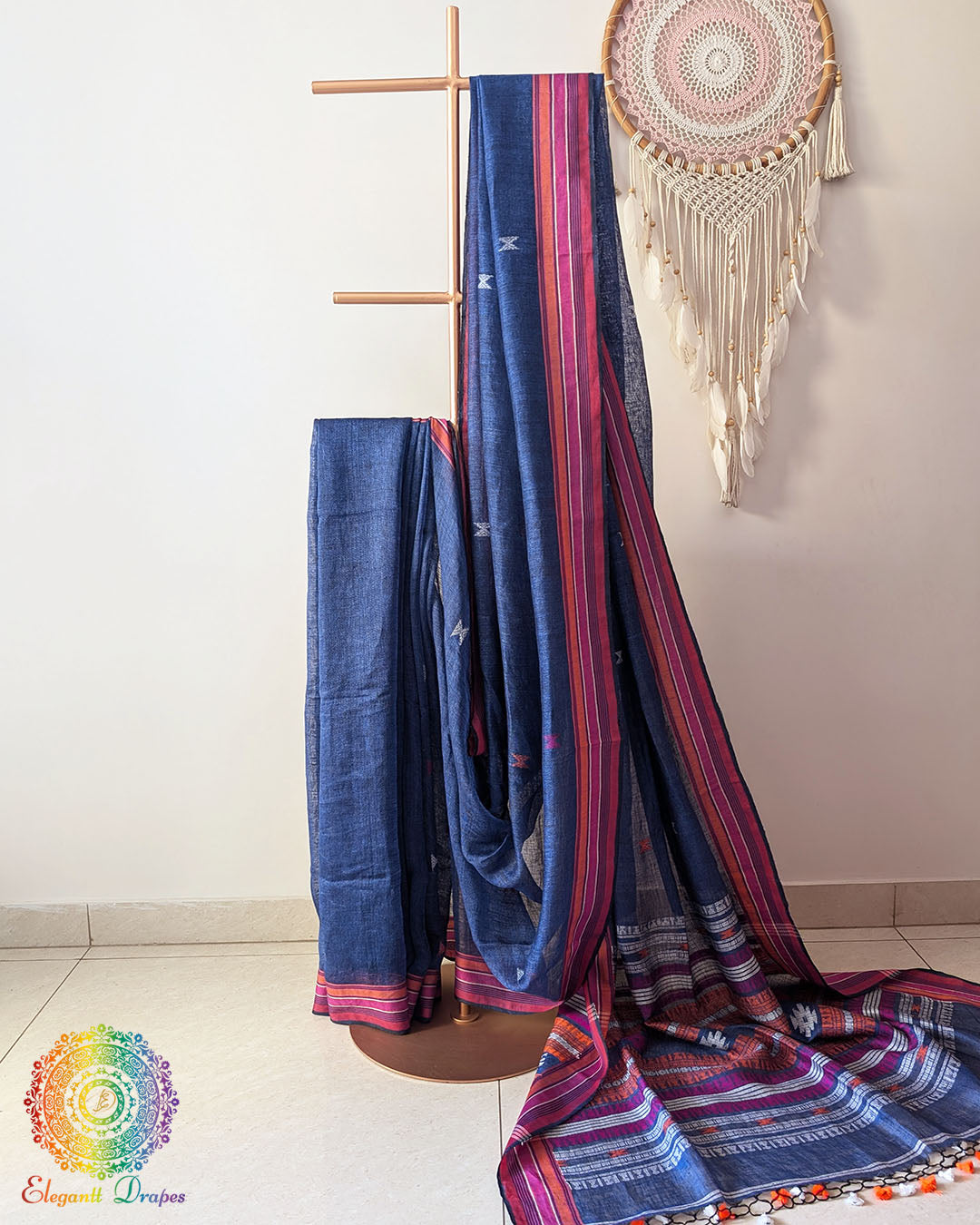 Blue linen Bhujodi weave saree on mannequin showing complete drape and fall