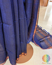 Pleats detail of navy blue linen saree showing texture and fall