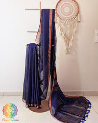 Navy blue linen saree with sequins on mannequin showing complete drape